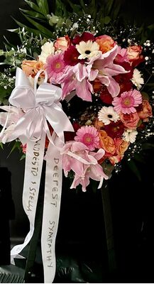 Funeral wreath on "oasis moss standing  base"