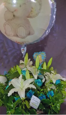 Arrangement of flowers for new born baby