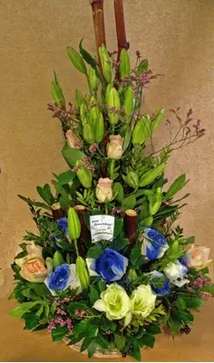Arrangement of flowers for new born baby