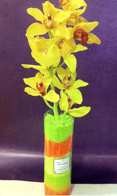 Vase with cymbidium orchid