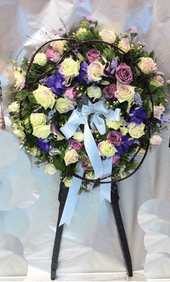 Funeral wreath on "oasis moss standing  base" with exclusive flowers.