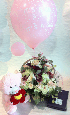 Lovely flowers in basket with accessories for new born girl!!!