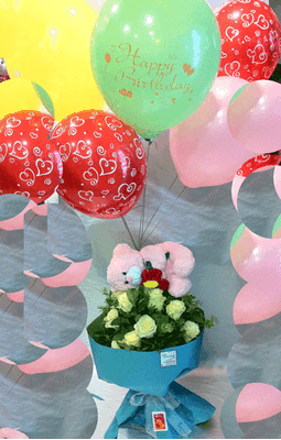 (19) white roses A' quality  Ecuador with greens gift wrapped. + (1) teddy bear 20cm +(7) balloons Helium