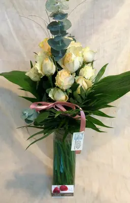 Mixed colored roses in wooden pot. (21) stems.