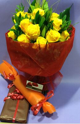 (20) yellow roses A' quality Dutch gift wrapped with greens (extra wine & chocolates)