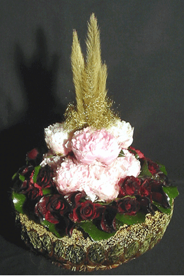 Basket with paeonias and roses