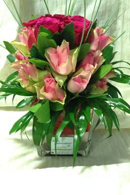 Arrangement in glass vase with romantic Roses