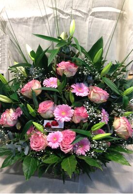 Basket flower arrangement for new born baby