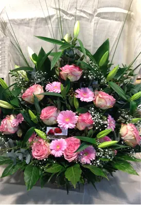 Basket flower arrangement for new born baby