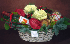 Christmas basket with flowers,wine and chocolates