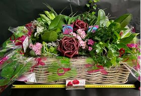 Design plant arrangement in  rattan basket. (exclusive)