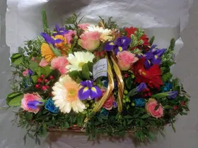 Multi colored flowers in basket