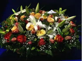 Big basket  with multi colored season flowers