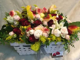Big basket  with multi colored season flowers