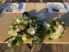 Wedding Flower Reception Decoration.Tables By the Pool or Sea.Wedding Flower Reception Decoration.Tables By the Pool or Sea.