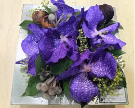 Arrangement with vanda orchids in zink tray