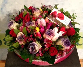 Arrangement in glass vase with white flowers