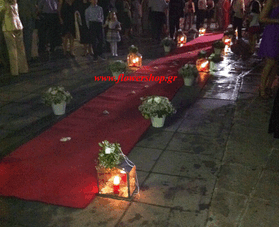 Church corridor carpet, flowers & candles