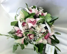 Arrangement with cymbidium orchids in "paper look" ceramic pot