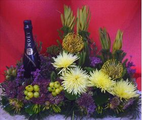 Flower arrangement with champagne