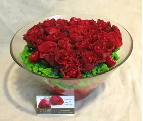 Red roses  A' quality Dutch inside quality glass vase.