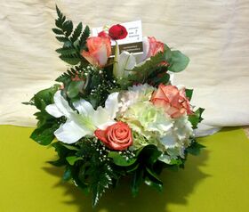 Season flowers arrangement in small basket.Special.