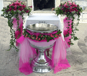 Baptismal decoration. Twin vases + garland.