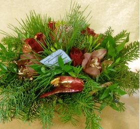 Christmas red flowers in small basket
