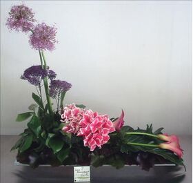 Flower arrangement on metal tray