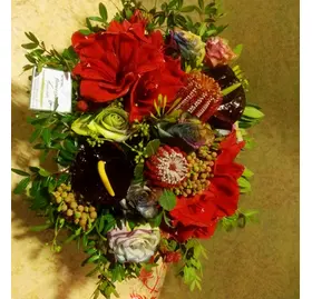 Autumn basket with season flowers.