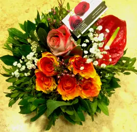 Season flowers arrangement in small basket.Special.