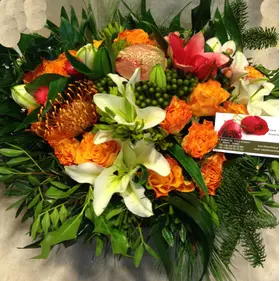 Christmas Arrangement Tropical Flowers & Candle & Decoration.
