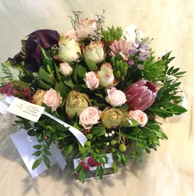 Flowers & dried oak leaves. Autumn flavor arrangement.Exclusive
