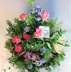 Small winter basket with  season flowers
