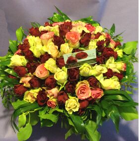 Pink & Red Roses (100) stems round basket arrangement. Exclusive Varieties !