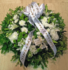 White & green condolences wreath.