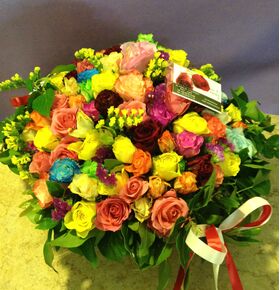 Mixed colored roses in Basket. Party Poses  (100)  stems.