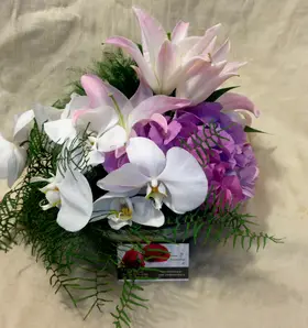 Arrangement in vase with decorative colored sand layers!!! Exclusive Flowers !!!