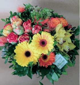 Multi colored flowers in basket