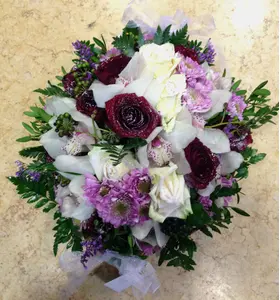 Winter "Snowy" basket with elegant flowers. Round