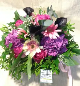 Lilac and Purple Spring with Joyful  Flowers in Basket