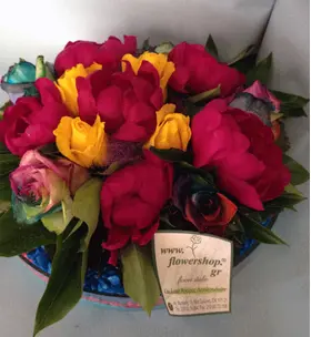 Flower arrangement in glass tray with autumn flavor