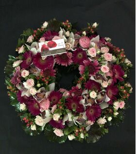 Wreath with pink flowers !!! (on oasis moss base diam.appr. 0,50m).