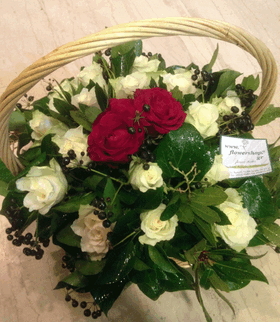 Basket  with white roses & (2) "lover" reds in the center