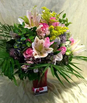 Spring flowers in glass vase. Exclusive.