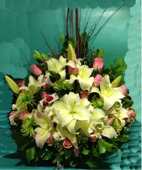 Basket arrangement  with pink season summer flowers