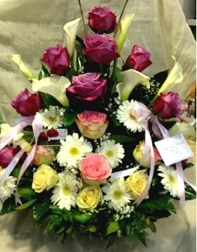 Basket flower arrangement for new born baby