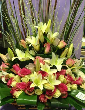 Exclusive Arrangement in basket. Pink