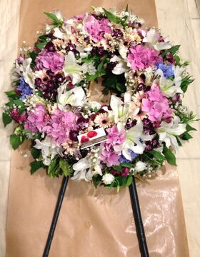 Funeral wreath on "oasis moss standing  base"