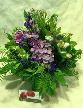 Arrangement in vase with decorative colored sand layers!!! Exclusive Flowers !!!